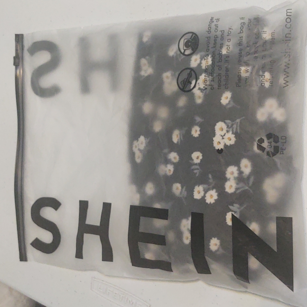 Black flower mini skirt